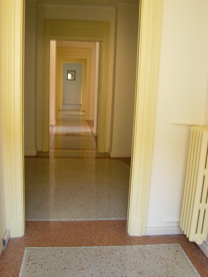 Polishing of Venetian terrazzo flooring Restored Venetian terrazzo flooring