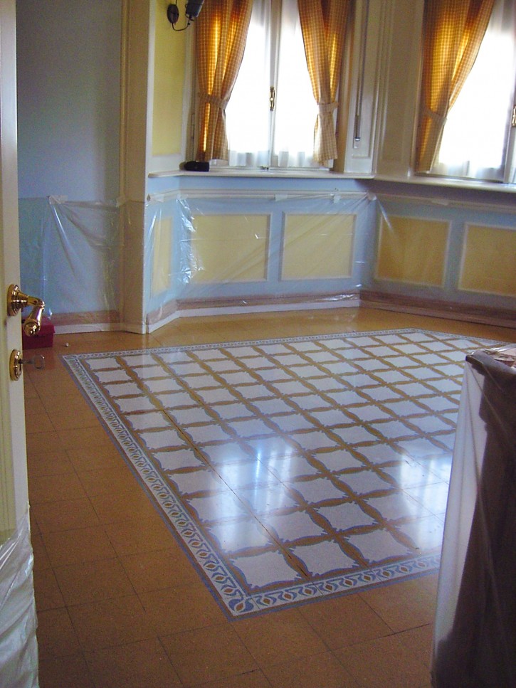 Polishing of terrazzo flooring Polishing of terrazzo flooring made with terrazzo tiles, achieving a satin, semi-gloss effect